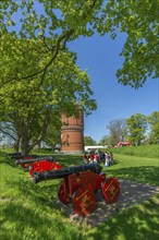 Nyborg Castle, medieval fortress with moat and ramparts, brick building, festival with soldiers in