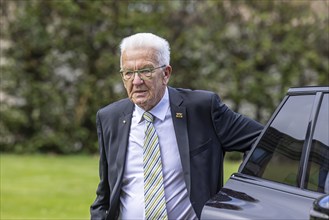 Winfried Kretschmann, Minister President, Green Party. Getting out of his official car, Neues