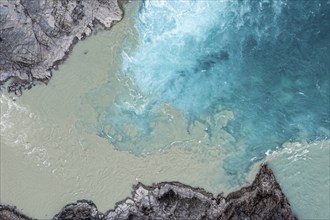 Confluence of river Rio Baker and Rio Neff, aerial view, muddy water of Rio Neff merges with