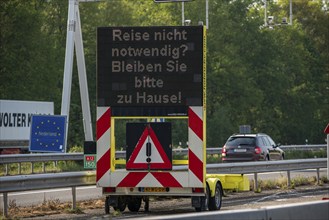 German-Dutch border at Emmerich-Elten, A3 motorway, signal board asks travellers to only make