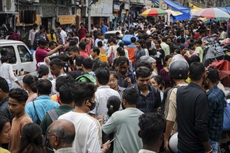 Crowd of people to shop at a street market ahead of Durga Puja festival on October 7, 2024 in