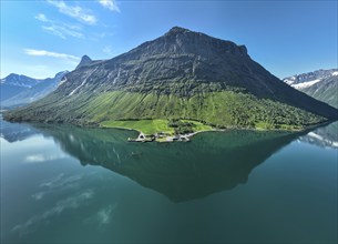 Panoramia aerial view of the inner Hjorundfjord, Mt. Stalbergneset, farm at the fjord, Norway,