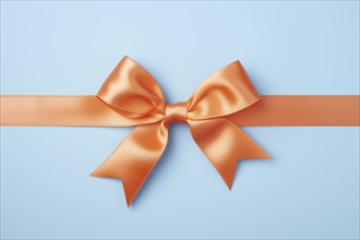 Orange tied silk ribbon on blue background. KI generiert, generiert, AI generated