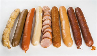 Food, meat products, various sausages on a white surface AI generated, AI generated