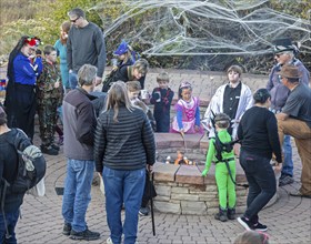 Lakewood, Colorado, Families enjoy the pre-Halloween Haunted Trail event at Bear Creek Lake Park,