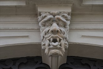 Grotesque above the entrance portal of the Knaufmuseum, Marktpl., Iphofen, Lower Franconia,