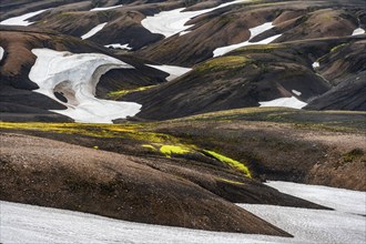 Volcanic landscape with hills and snow, Laugavegur trekking trail, Landmannalaugar, Fjallabak