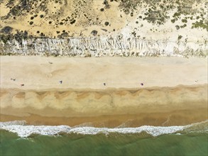 Beach life at the Asperillo cliff, the highest dune cliff in Europe. At the Atlantic Ocean near