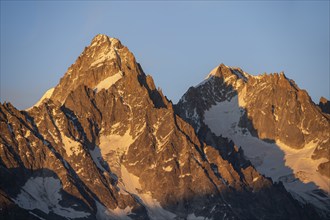 Rocky peaks at sunset, alpenglow, Aiguille de Chardonnet and Aiguille d'Argentière, Mont Blanc