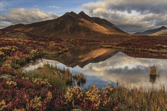 Morning light, clouds, fog, autumnal tundra, autumn colours, wilderness, mountains reflected in