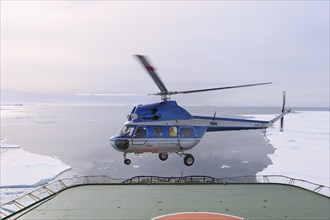 Helicopter takeofft on deck of Icebreaker Kapitan Khlebnikov, Snow hill island, Weddel Sea,