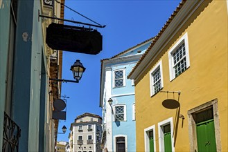 Old colonial style houses with bold colors in the historic Pelourinho neighborhood in the city of