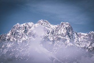 Majestic snow-covered mountain range under a clear sky in winter, Kaisergebierge, The Mountain