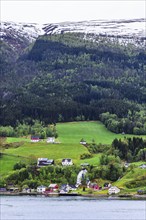 Mountains and Fiord over Norwegian Village in Olden, Innvikfjorden, Norway, Europe