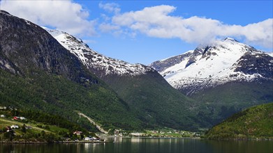 Mountains and Fjord over Norwegian Village, Olden, Innvikfjorden, Norway, Europe