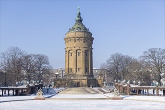 Historic water tower of Mannheim at Friedrichsplatz in winter, snow, Baden-Württemberg, Germany,