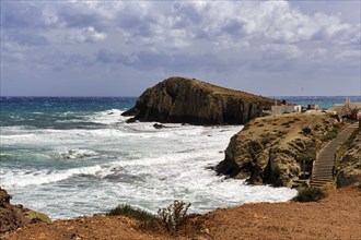 View of rocky coast, coastline at La Isleta del Moro, Almeria, Cabo de Gata, Cabo de Gata-Nijar,