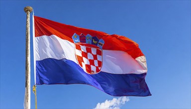 Flags, the national flag of Croatia flutters in the wind