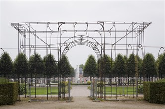 Arc de Triomphe steel frame arbour in the Schwetzingen palace garden in late summer, Schwetzingen,