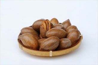 Pecans in a bowl (Carya illinoinensis)