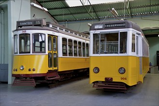 Old trams in the Museu da Carris tram museum, Lisbon, Portugal, Europe