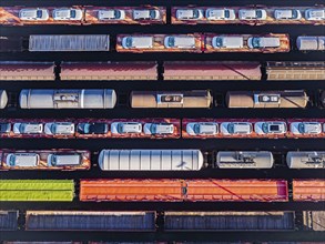 Deutsche Bahn AG marshalling yard. Many goods trains are parked on the tracks with tank wagons, car