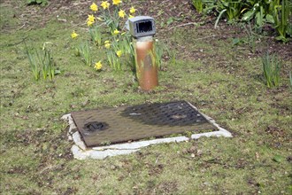 Garden septic tank vent access and ventilation, England, UK