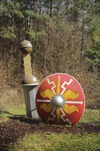 Sculpture Roman sword and shield by Jox Reuss 2004, Roman, stabbing weapon, weapon, stuck in the