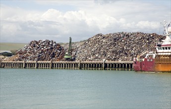 Scrap metal piled on quayside, Newhaven, East Sussex, England, United Kingdom, Europe