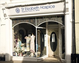 Charity shop window display, St Elizabeth Hospice, Woodbridge, Suffolk, England, United Kingdom,