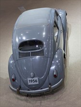 A Volkswagen Beetle with a small rear window, built in 1956, is on display at Techno Classica, the