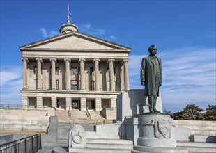 Statue of Edward Ward Carmack on the steps of the Tennessee state capitol building in downtown