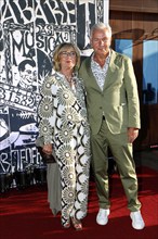 Klaus Wowereit and guest on arrival for the anniversary premiere of CABARET, The Berlin Musical at