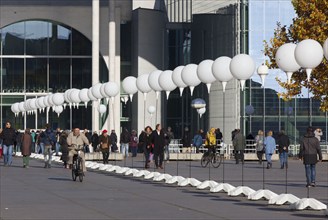 To mark the 25th anniversary of the fall of the Berlin Wall, illuminated balloons symbolise the