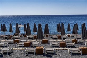 Beach, empty, organised, with sun loungers and parasols, catering, bay at Koutsounari Beach, on the