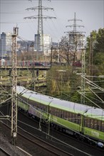 Flixtrain train on the railway line between Mülheim an der Ruhr, and Duisburg, busy railway line,