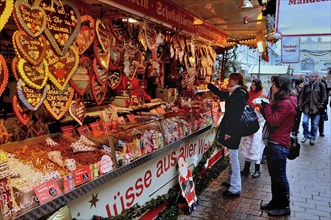 Gingerbread haerts in a stand at Christmas market in Potsdam, Brandenburg, Germany, Europe