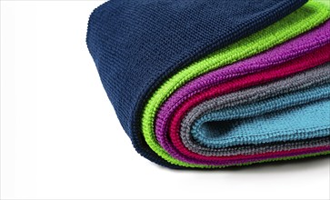 A stack of multicolored, microfiber cloths, for cleaning