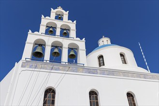 Santorini, Oia, bell tower of Panagia Platsani church on the main square, Cyclades, Greece, Europe