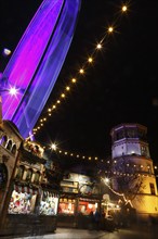 Christmas market with a ferris wheel on Burgplatz square, historic town centre, Dusseldorf, North