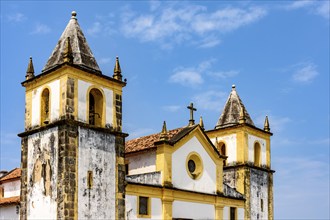 Baroque church tower with blue sky of the city of Olinda, Olinda, Pernambuco, Brazil, South America