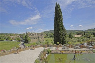 View from the Château with inner courtyard and pond on cityscape, Castle, Chateau, Lourmarin,