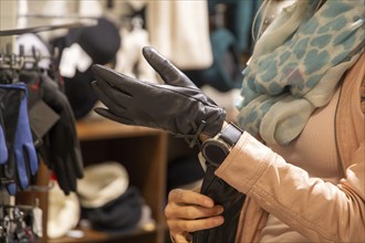 Elegant young woman enjoys shopping