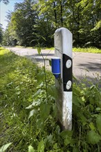 Wildlife warning reflector on roadside posts Reflective reflector to prevent wildlife accidents