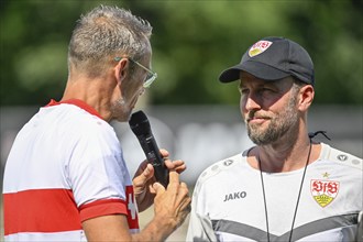 Stadium announcer Holger Laser in an interview, microphone, mic, with coach Sebastian Hoeneß VfB