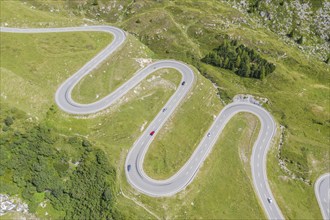 Drone shot, curves of Julier mountain pass, Switzerland, Europe