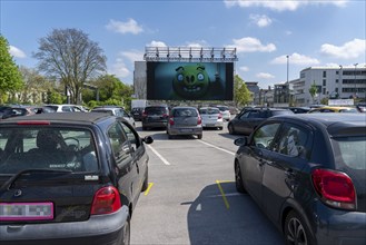 Temporary drive-in cinema, in the car park in front of Messe Essen, Grugahalle, large LED screen