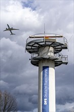 Radar tower of German Air Traffic Control, DFS, at Frankfurt Main Airport, FRA, aircraft taking off