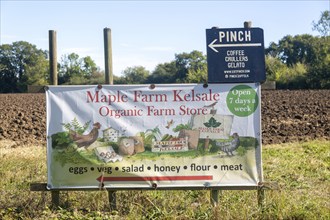 Banner sign for Maple Farm organic farm store shop, Kelsale, Suffolk, England, UK