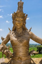 Statue of Dewi Sri, goddess of rice, rice goddess, Jatiluwih rice terraces, Bali Indonesia